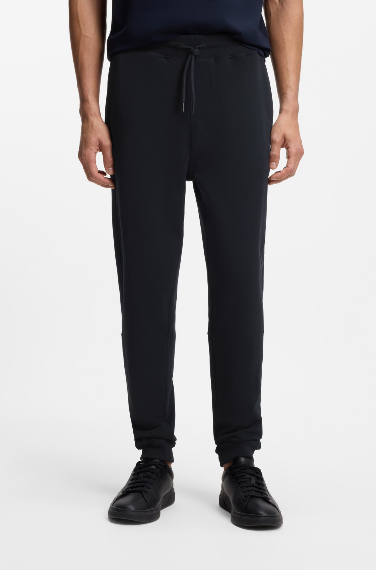 Logo-patch tracksuit bottoms in cotton terry