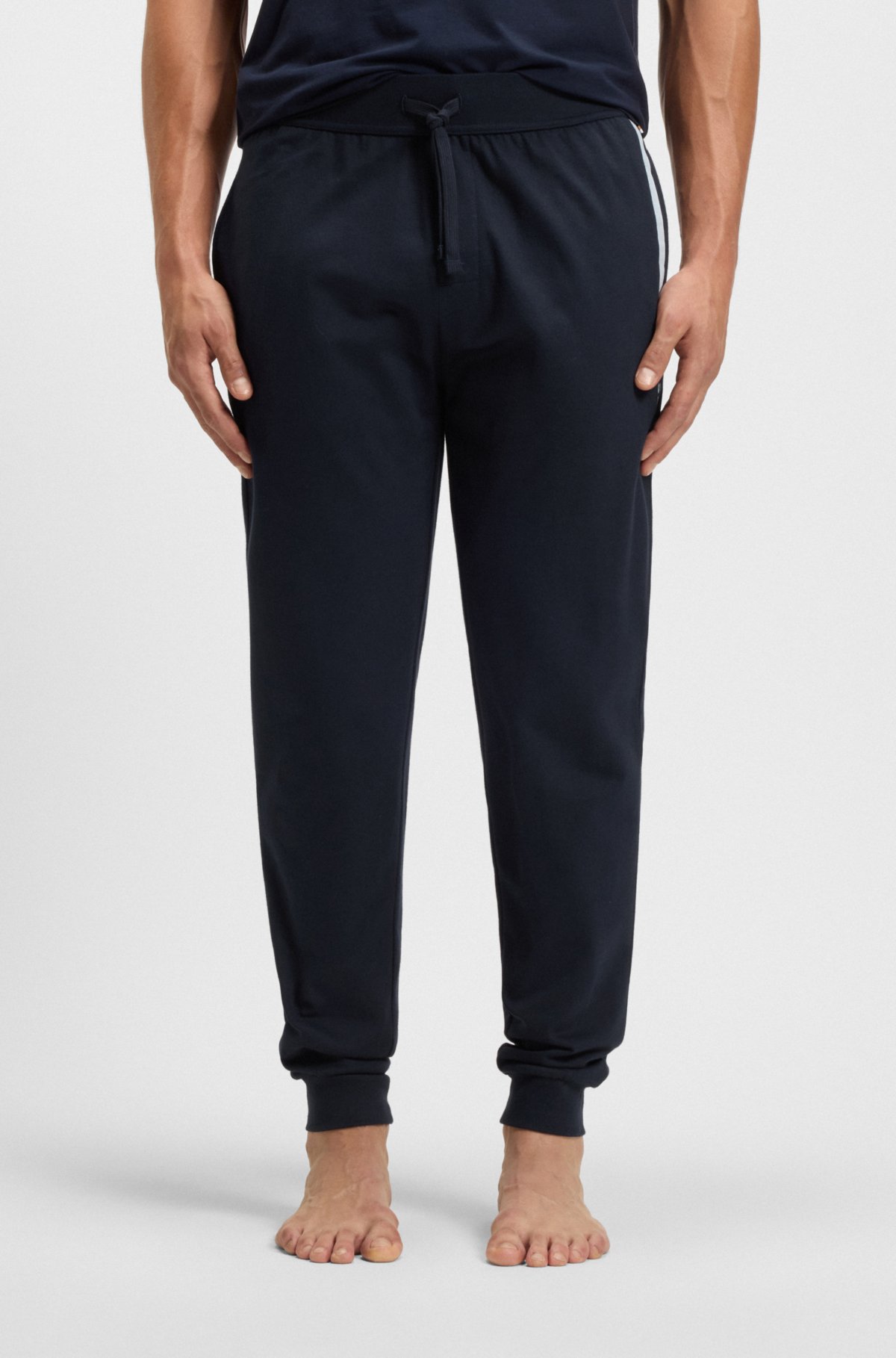 Logo-print tracksuit bottoms in cotton terry