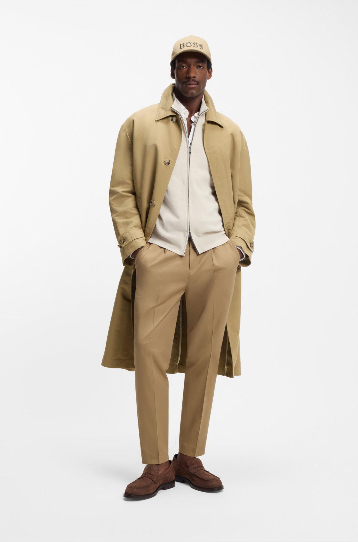 Water-repellent coat with concealed closure