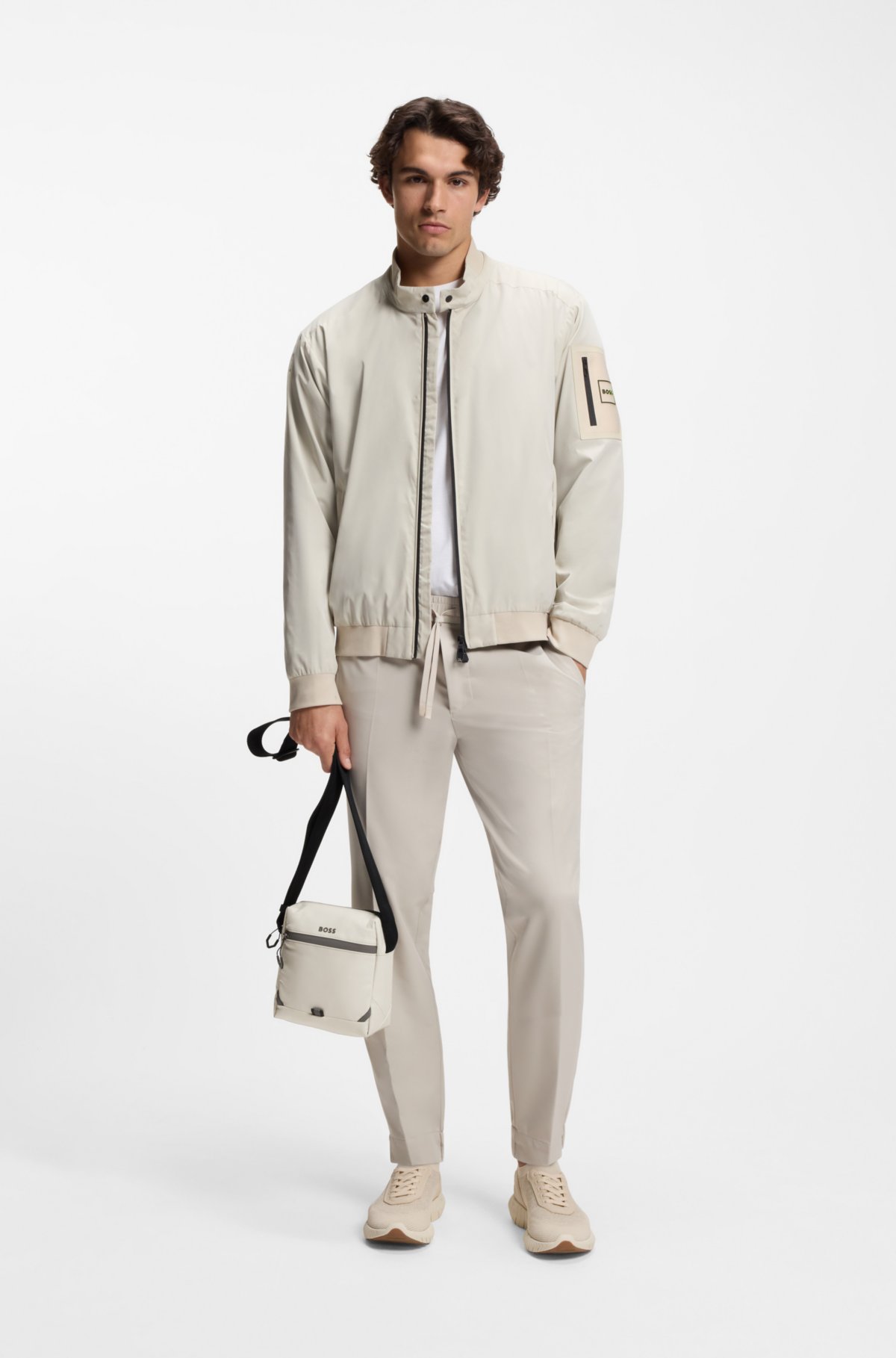 Reflective-detail reporter bag in faux leather