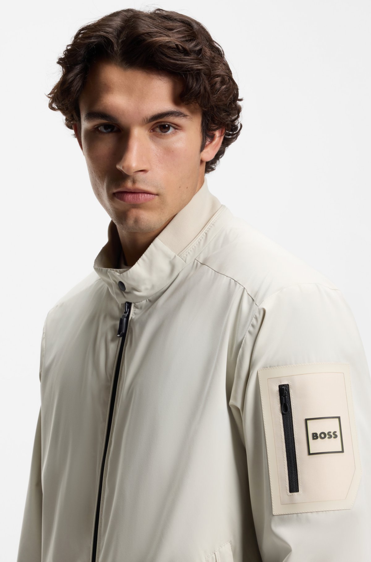 Double-piping blouson jacket with water-repellent finish