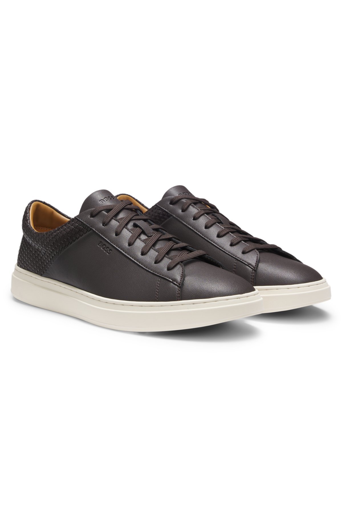Low-top trainers with woven and grained effects