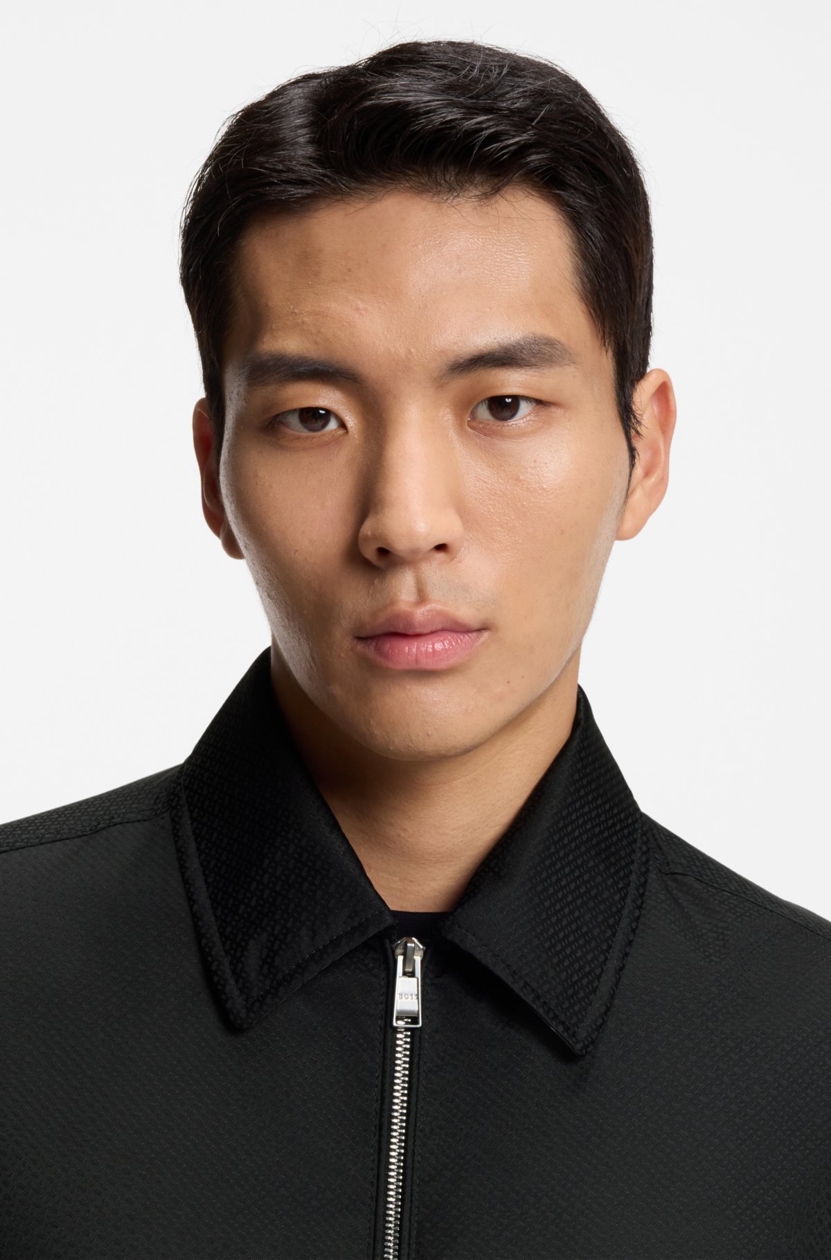 Micro-monogram jacket with water-repellent finish