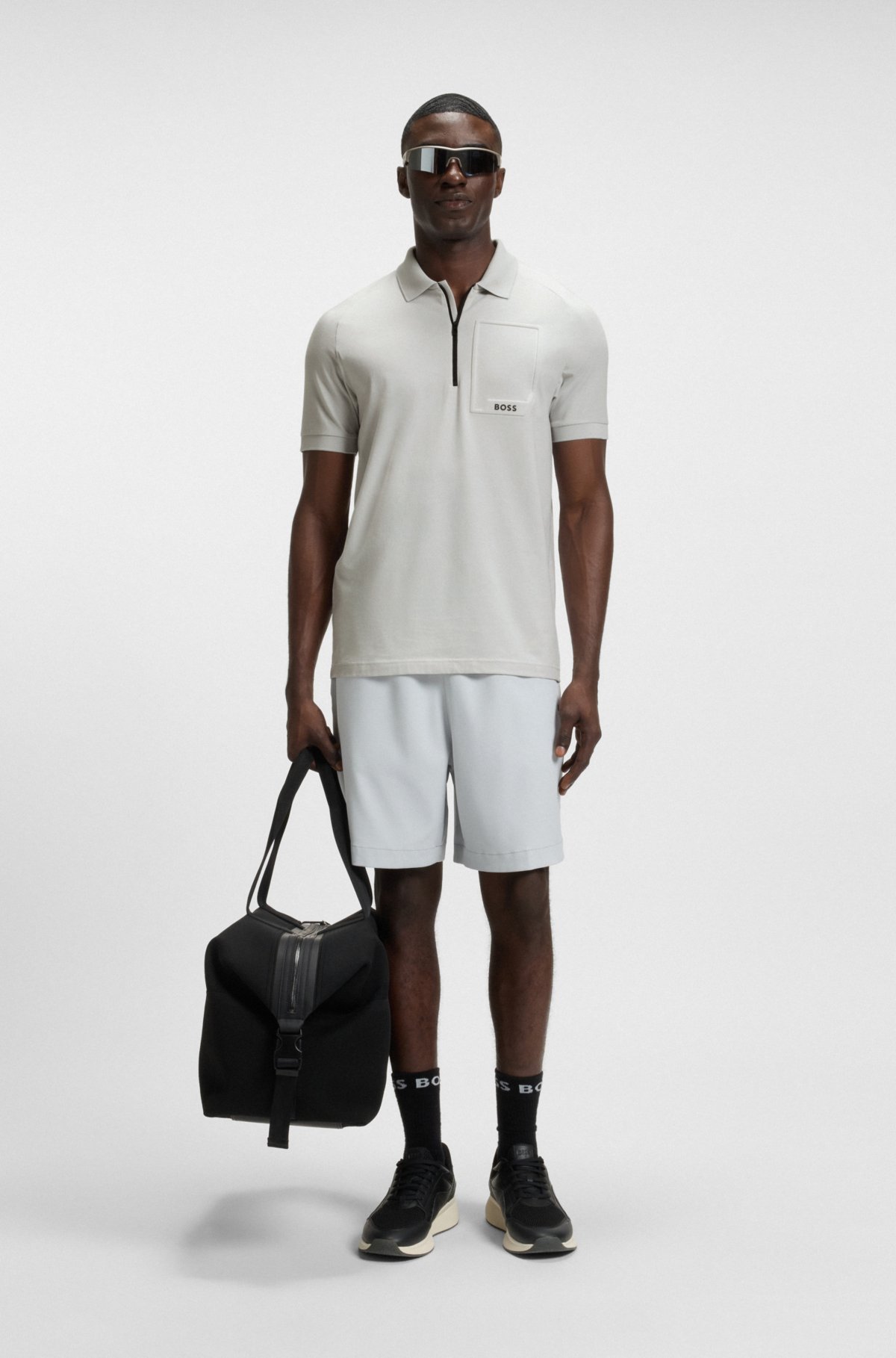 Zip-neck polo shirt in moisture-wicking fabric