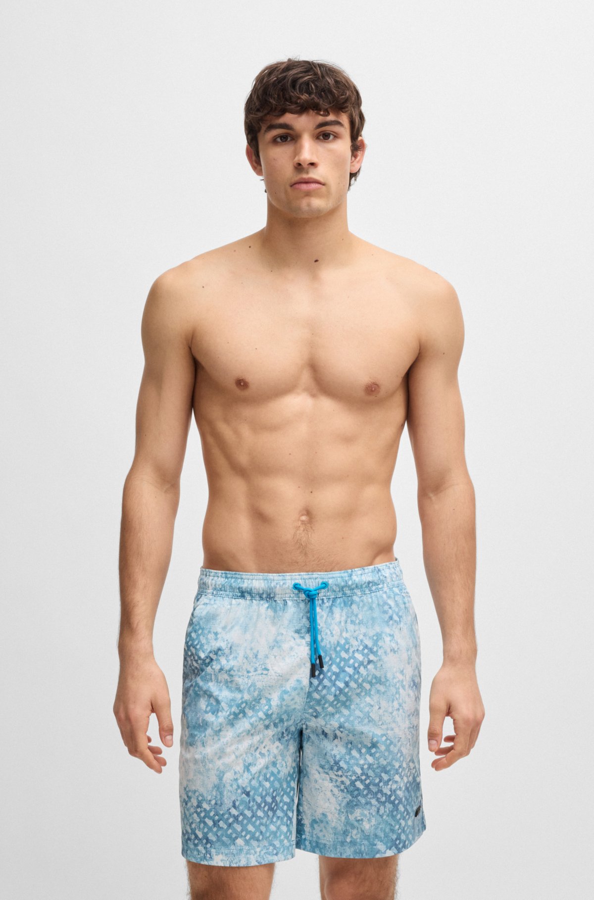 Logo-badge swim shorts with monogram artwork