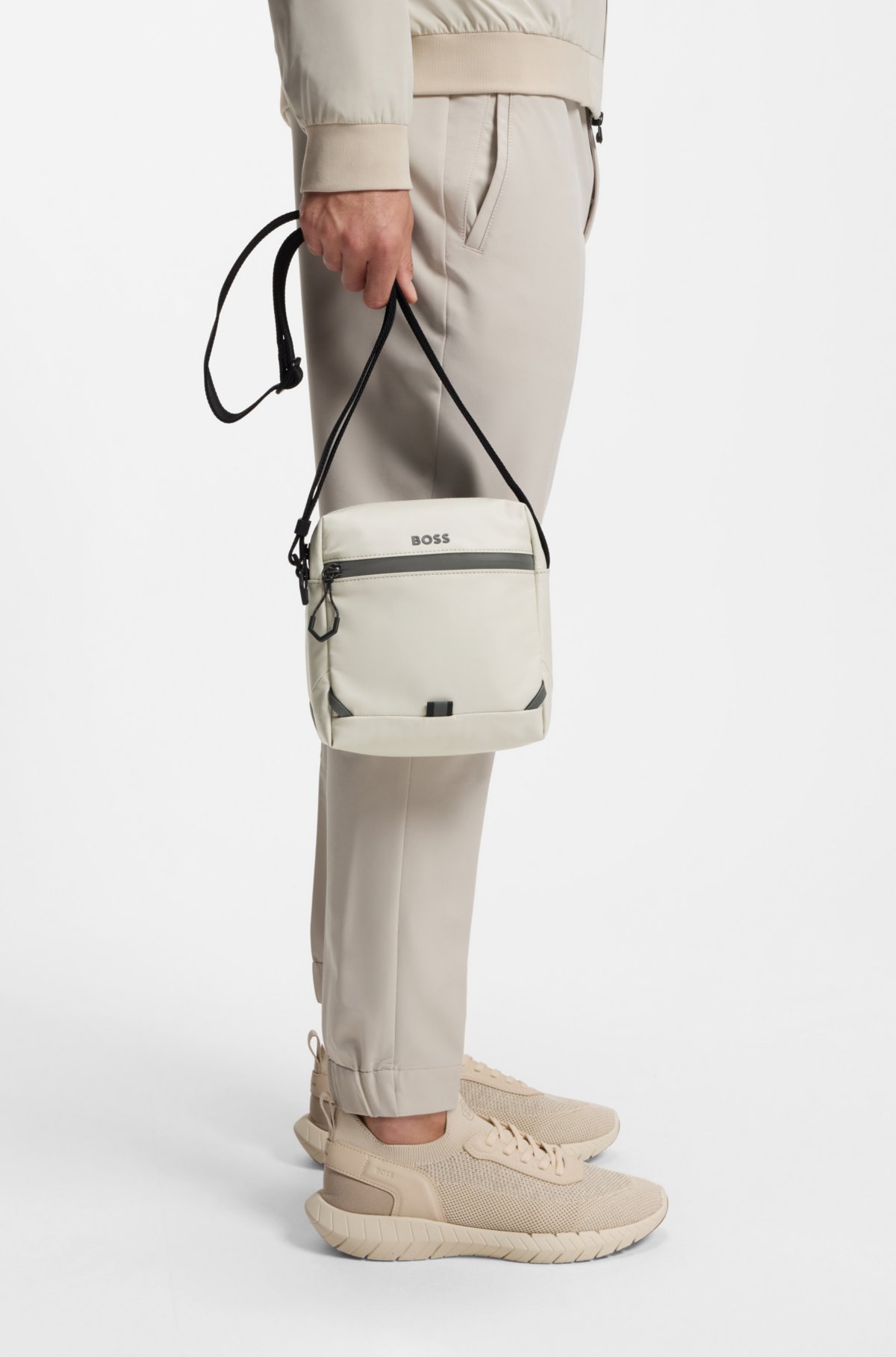 Reflective-detail reporter bag in faux leather