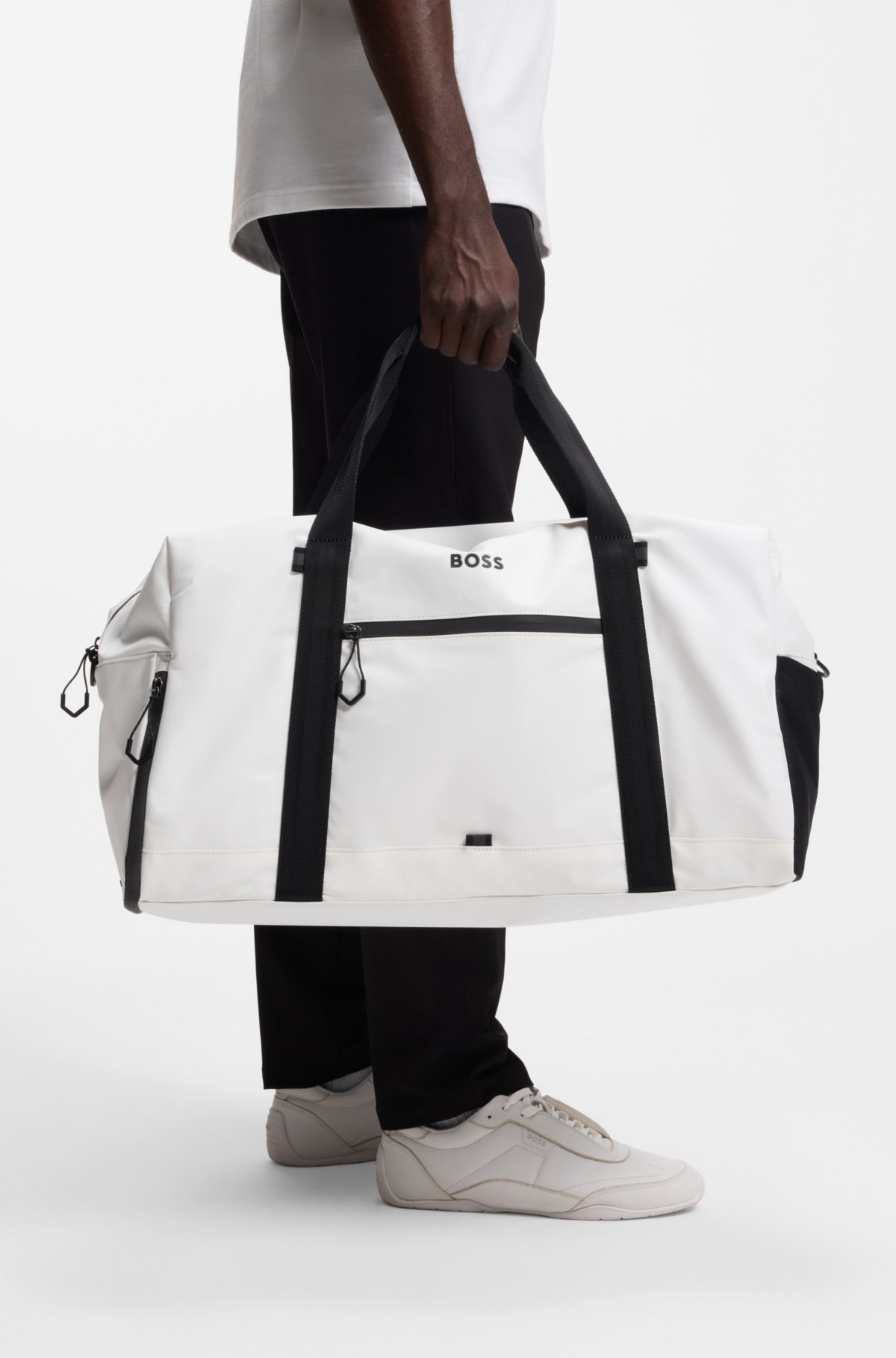 Faux-leather holdall with reflective zips