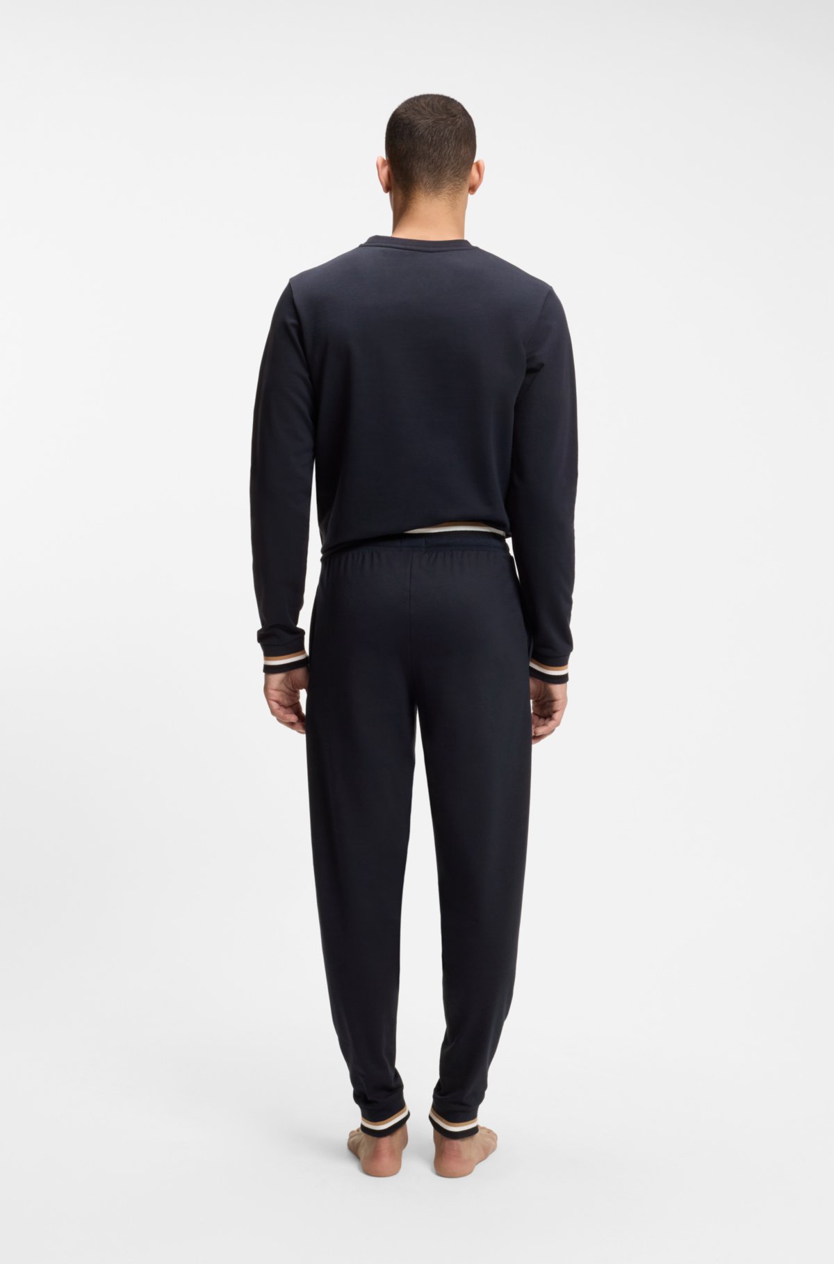 Cotton-terry tracksuit bottoms with signature stripes and logo