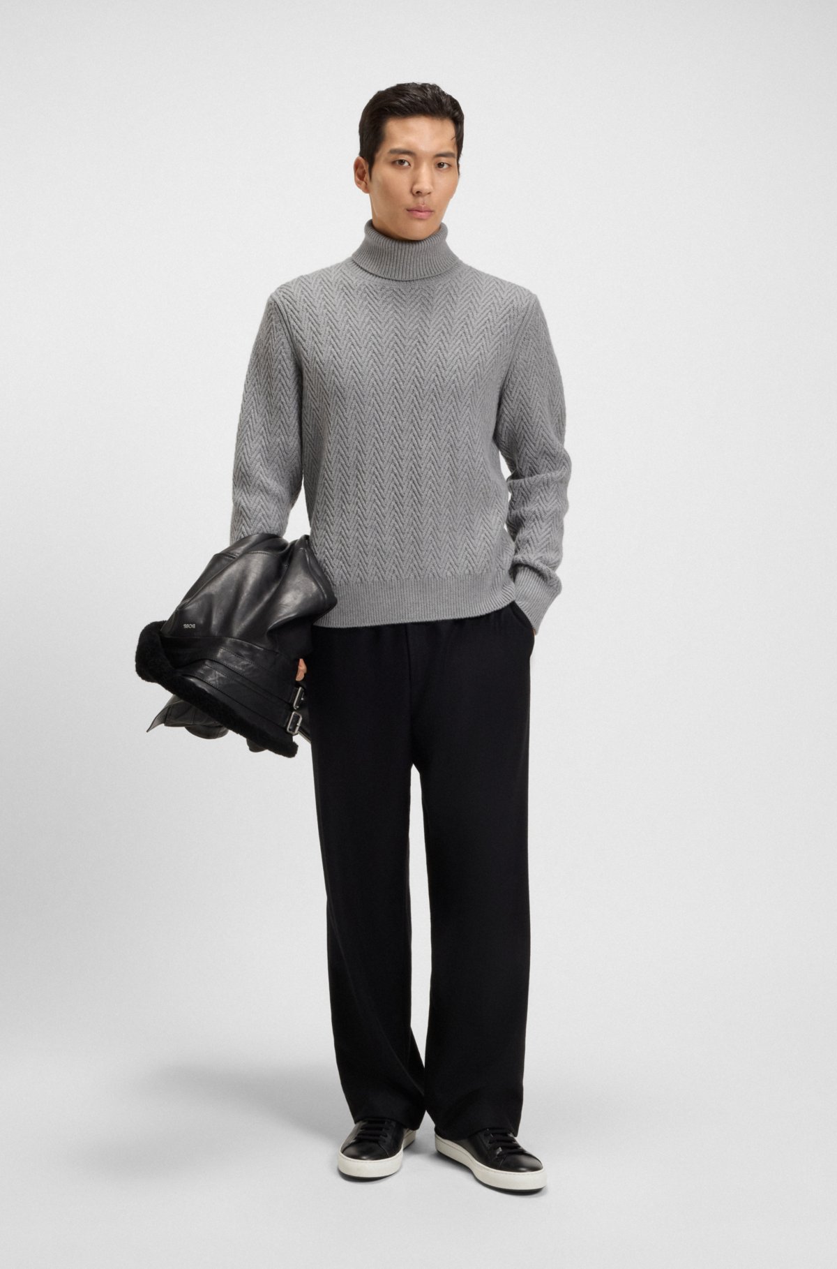 Rollneck sweater in herringbone virgin wool