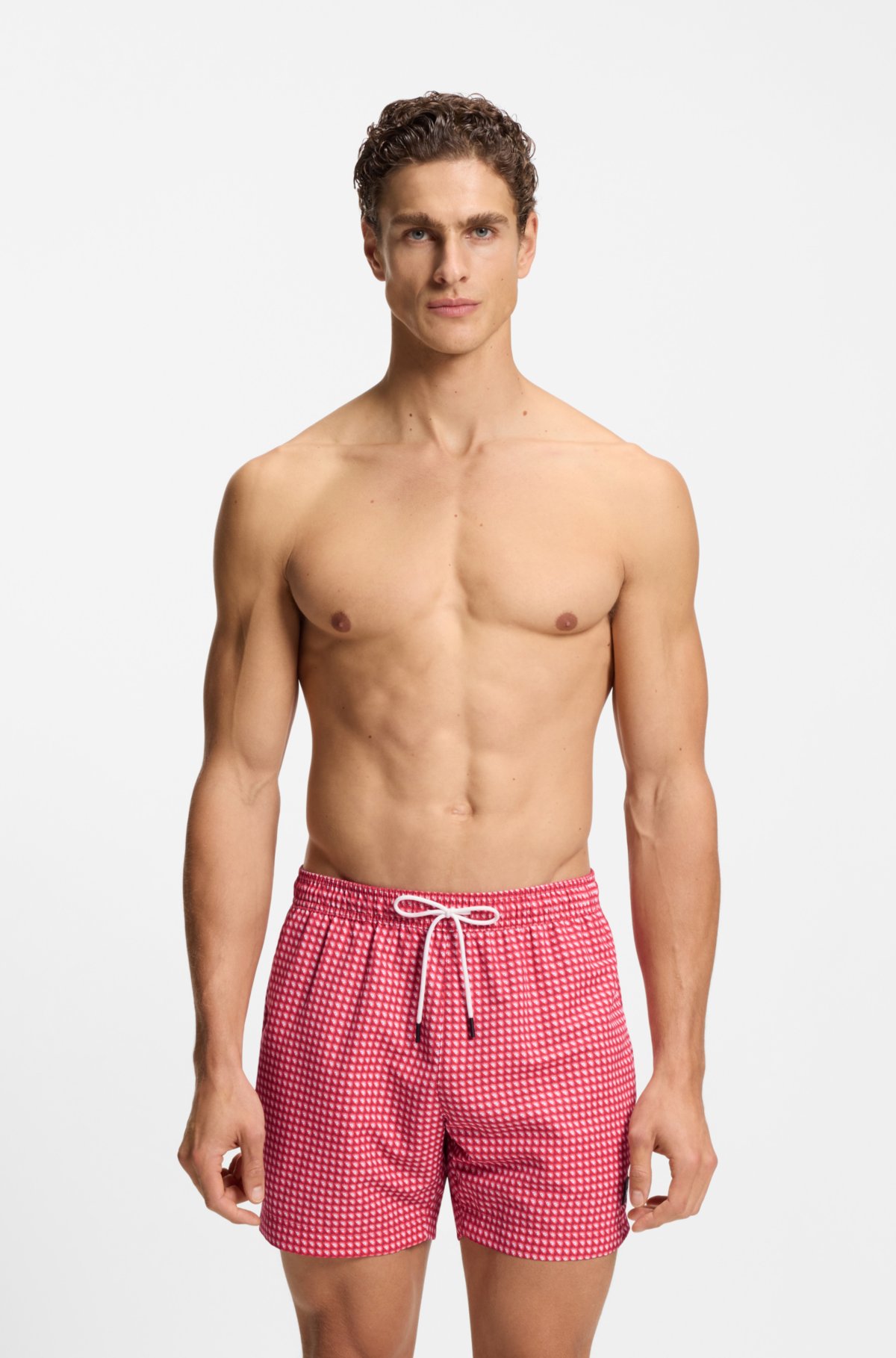 Micro-print swim trunks with logo patch