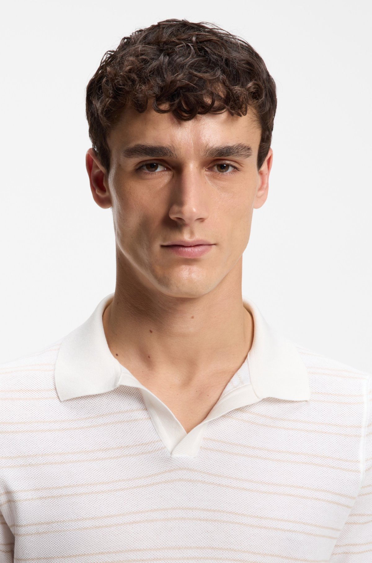 Cotton-blend knit polo with horizontal stripe.