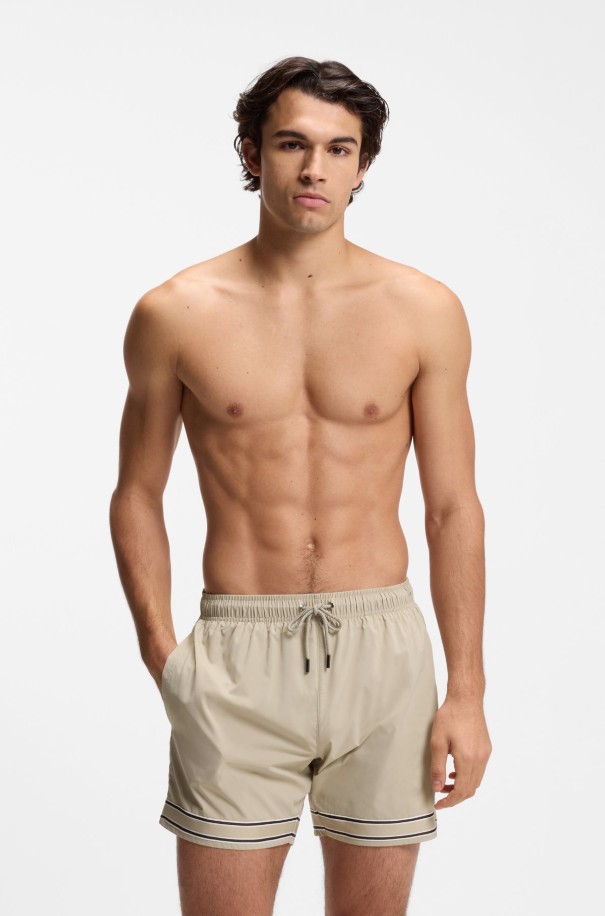 Drawstring swim shorts in stretch fabric with tape trim