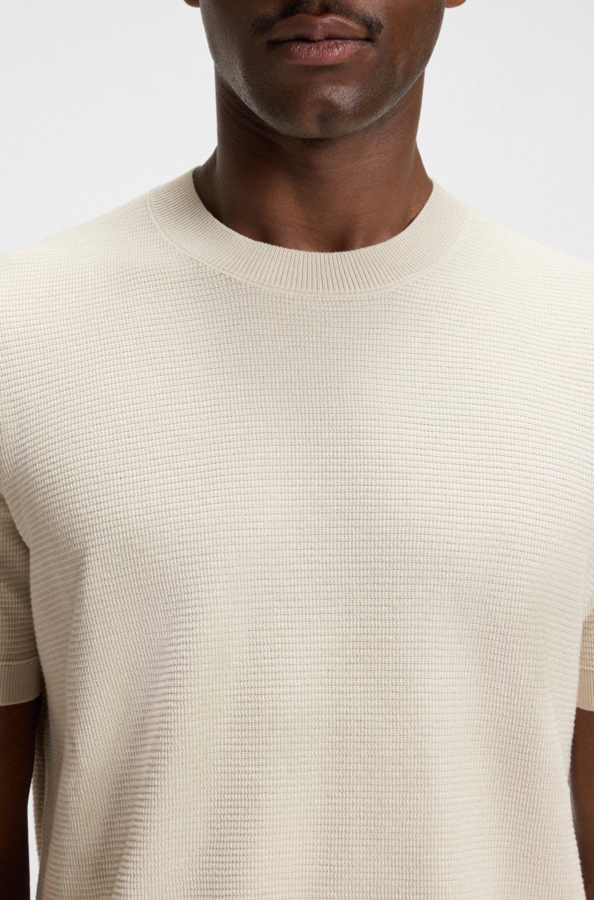 Knit sweater with mixed structures