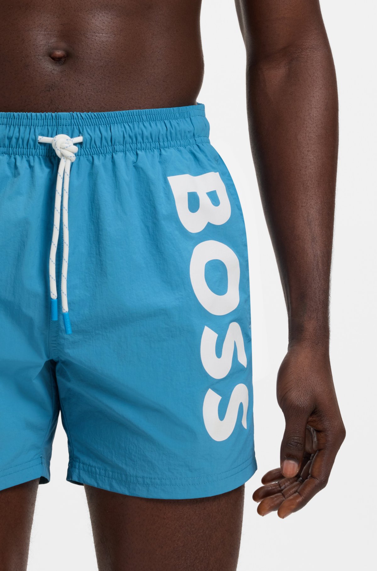 Quick-dry swim shorts with vertical logo print