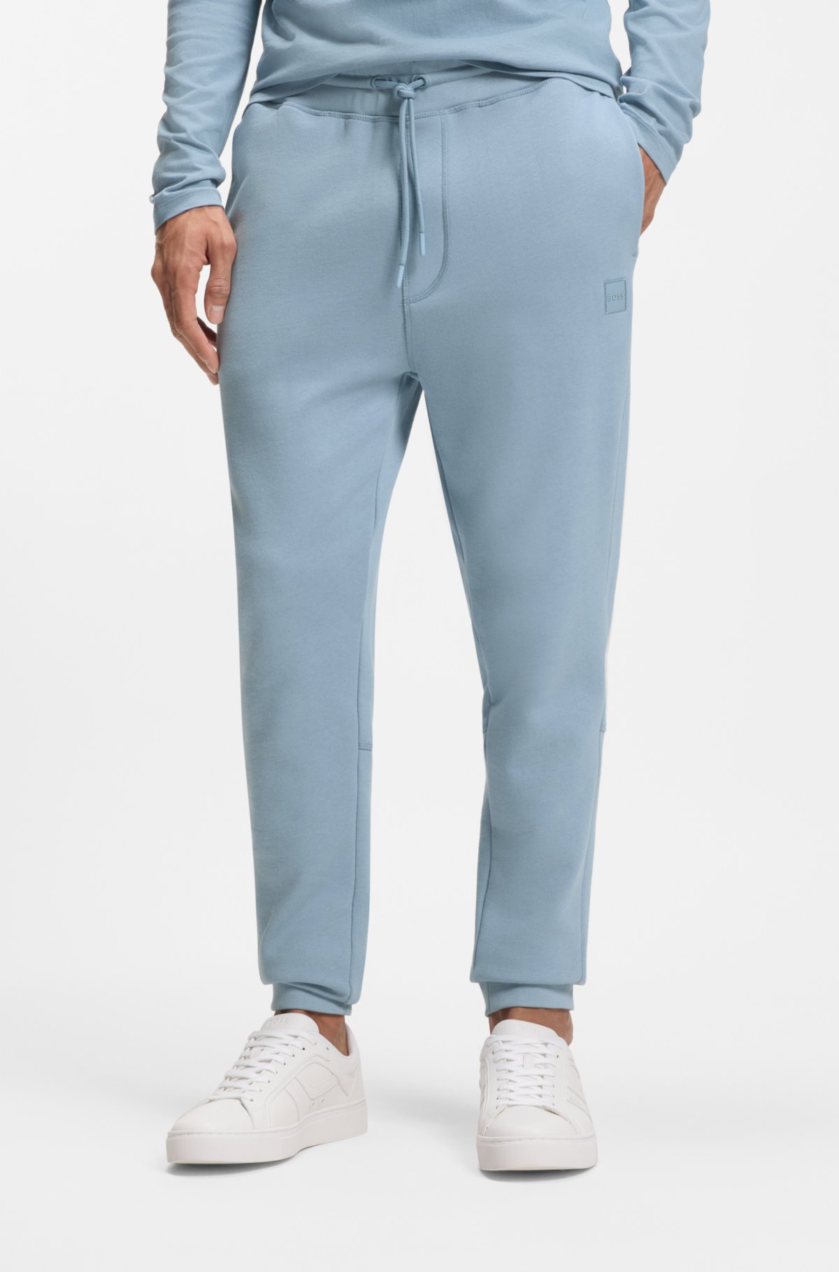 Logo-patch tracksuit bottoms in cotton terry