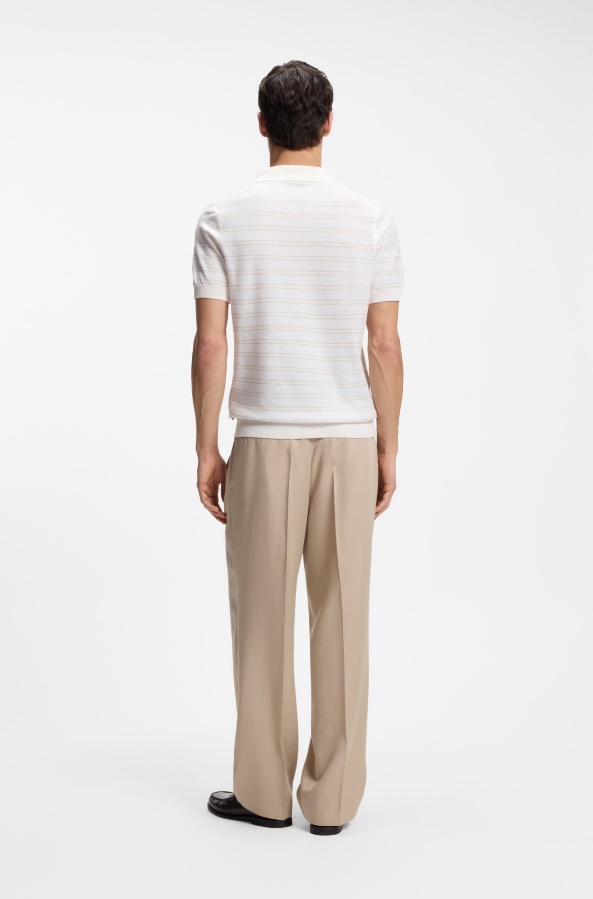 Cotton-blend knit polo with horizontal stripe.