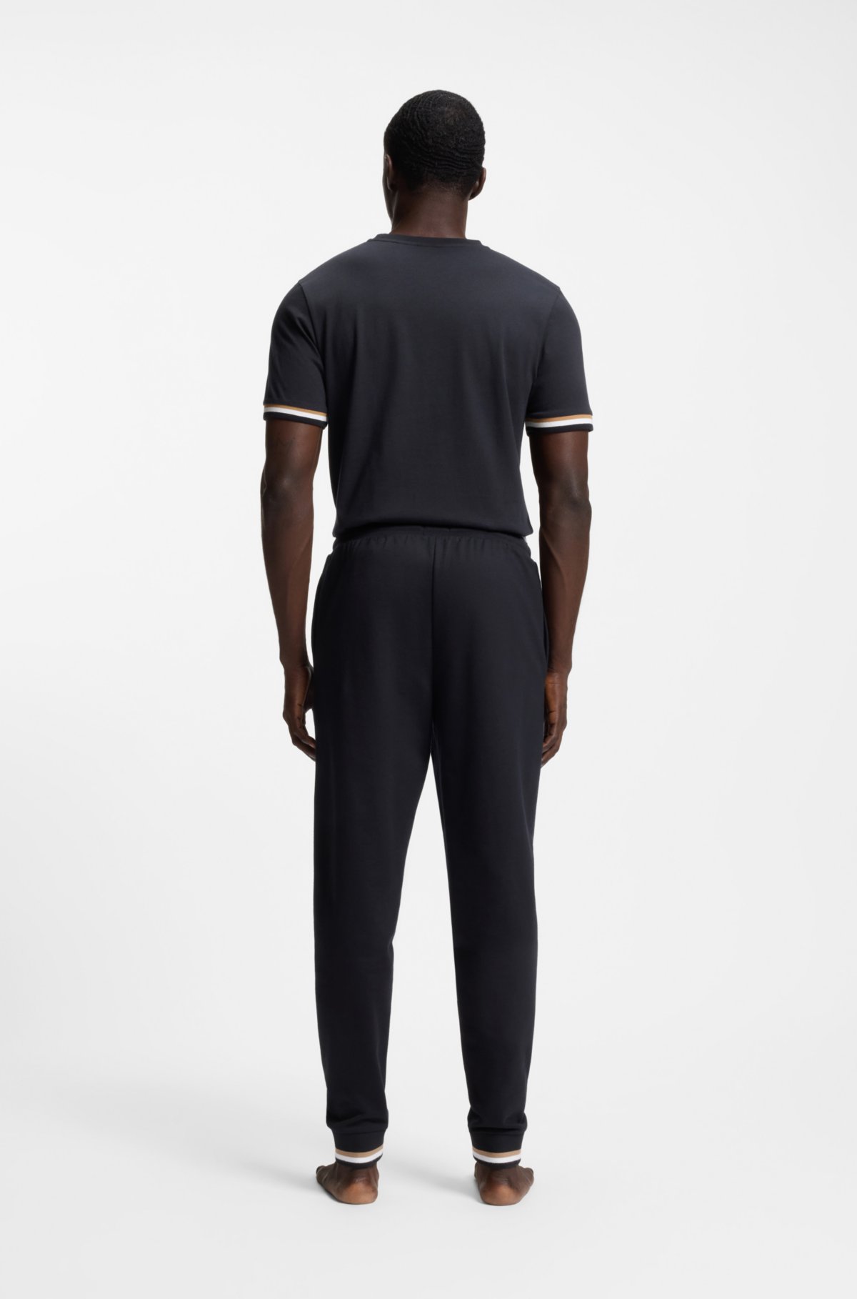 Cotton-terry tracksuit bottoms with signature stripes and logo